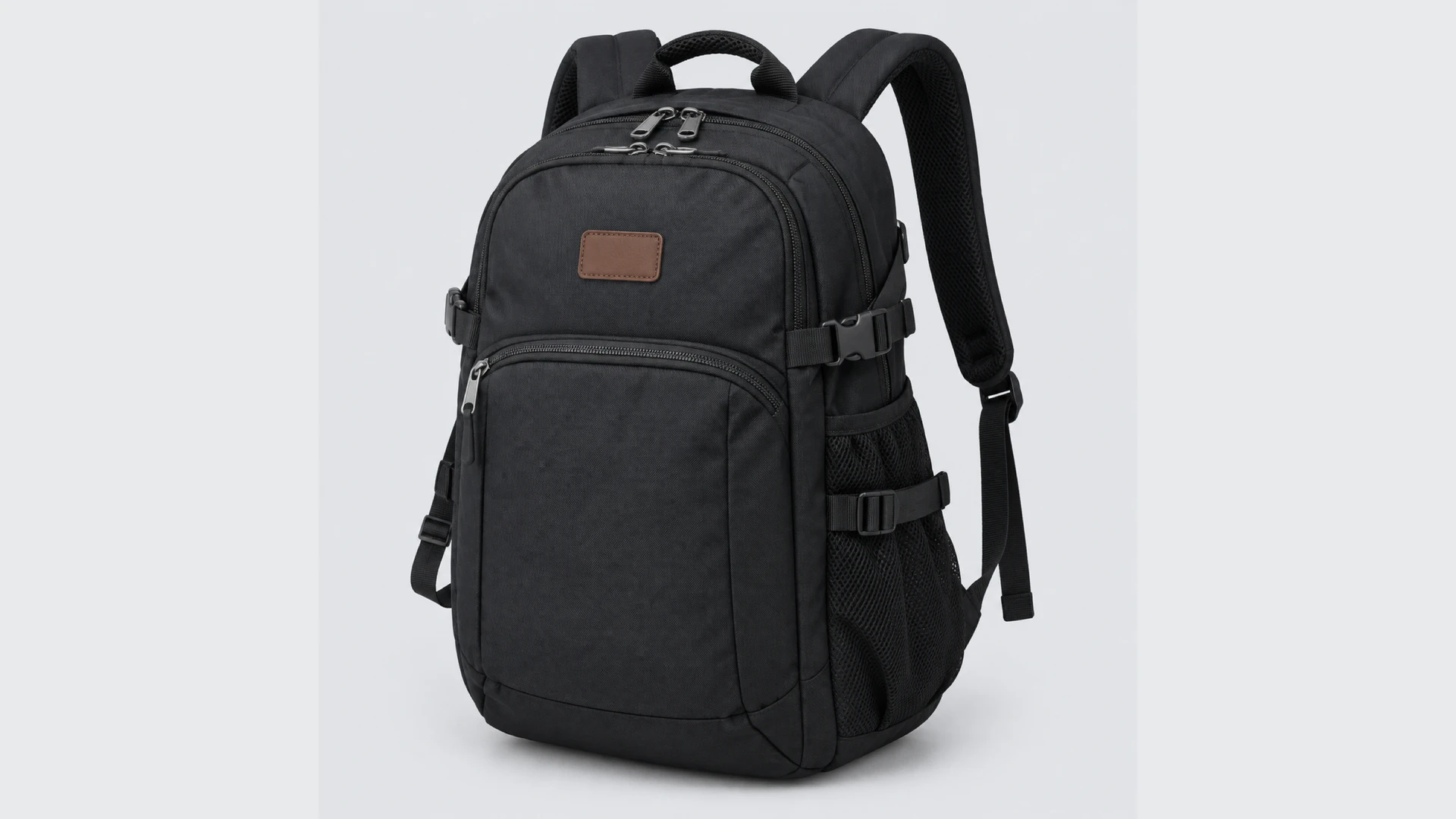 Technical backpack reference image with layered straps, zippers, buckles, mesh, and material zones